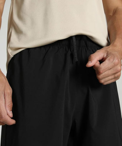 PA-Q12 (Puma train all day essentials 7" woven shorts black) 62692500