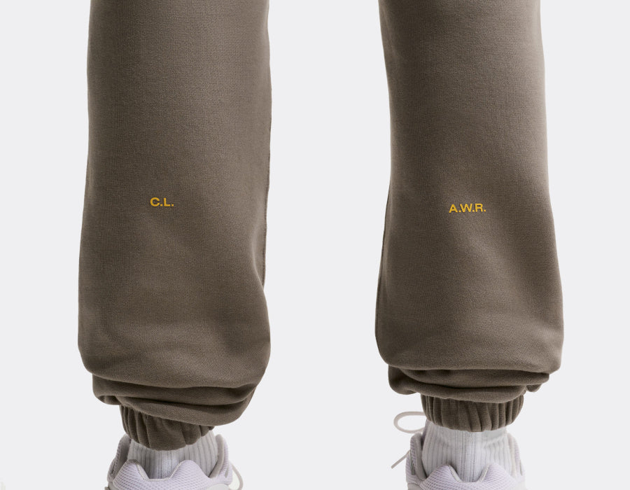 NA-R50 (Nike nocta fleece tracksuit bottoms olive grey/yellow ochre) 92696956