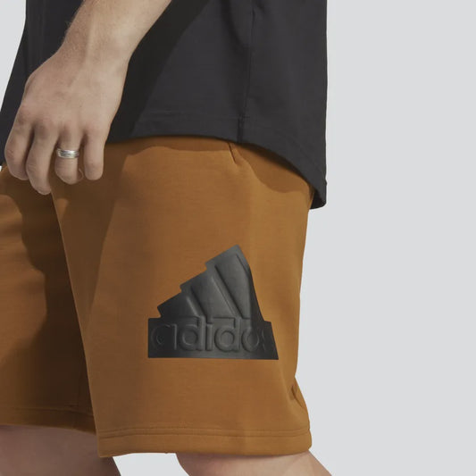 AA-T19 (Adidas future icons badge of sport shorts brown strata) 32293585 ADIDAS