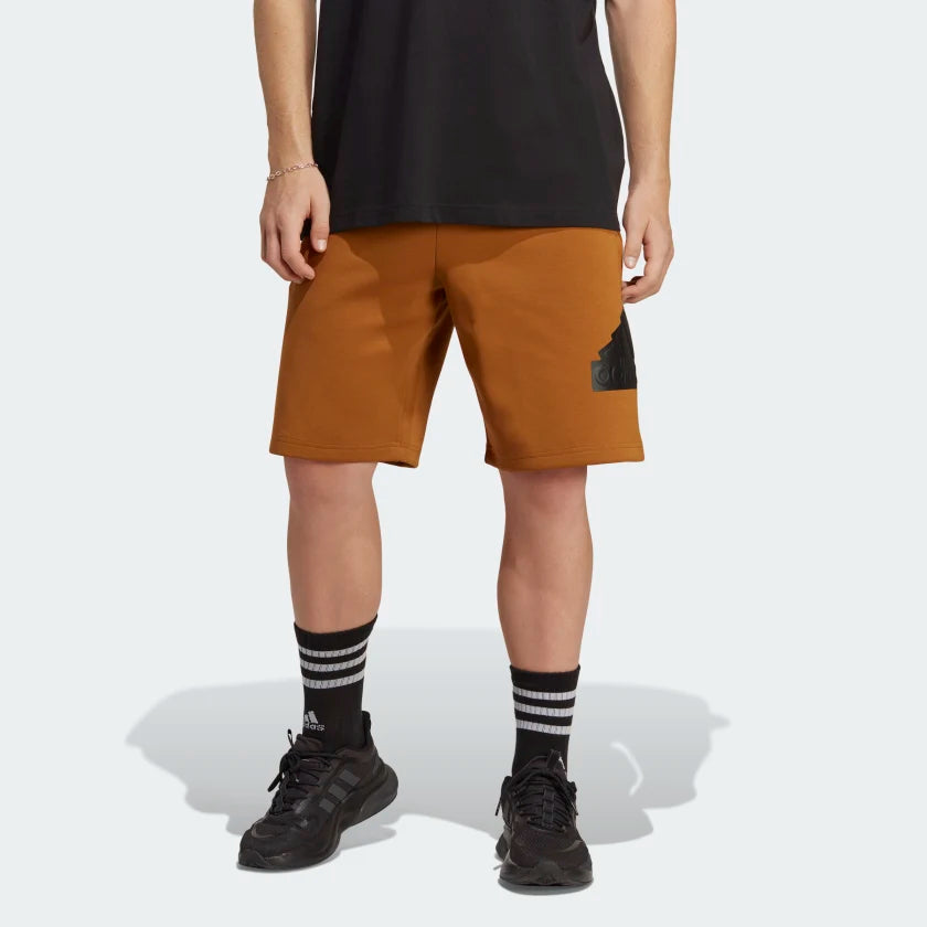 AA-T19 (Adidas future icons badge of sport shorts brown strata) 32293585 ADIDAS