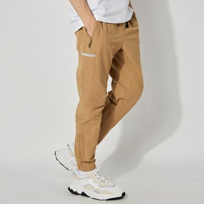 AA-P10 (Tech id track pant woven cardboard) 62198185 - Otahuhu Shoes