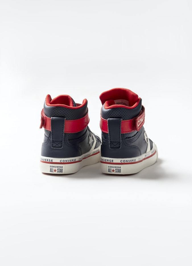 CT-T33 (Kid pro blaze strap hi obsidian/egret/university red) 102093500 - Otahuhu Shoes