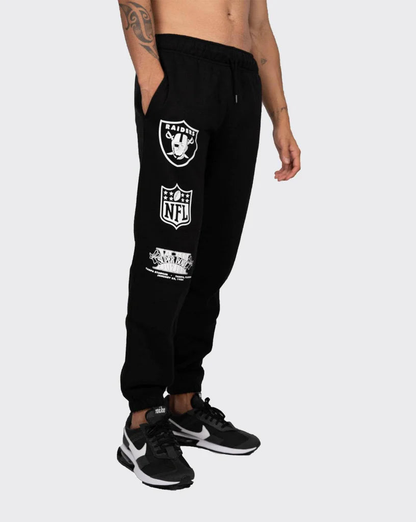 NEA-G3 (NE0297Q222 Trackpant la raiders black/metallic silver) 52294500 NEW ERA